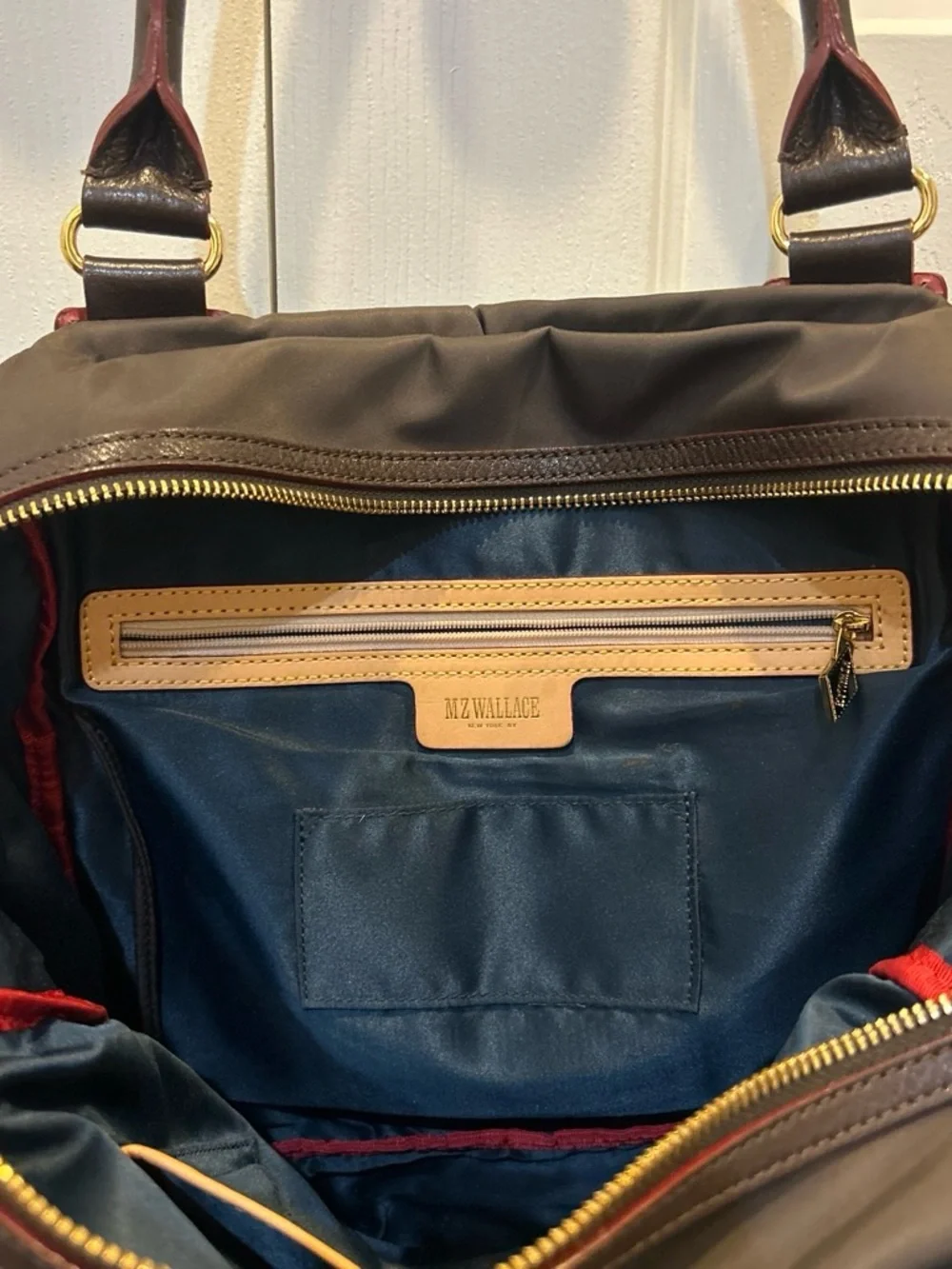MZ Wallace Shoulder Bag with Gold Hardware and red detail